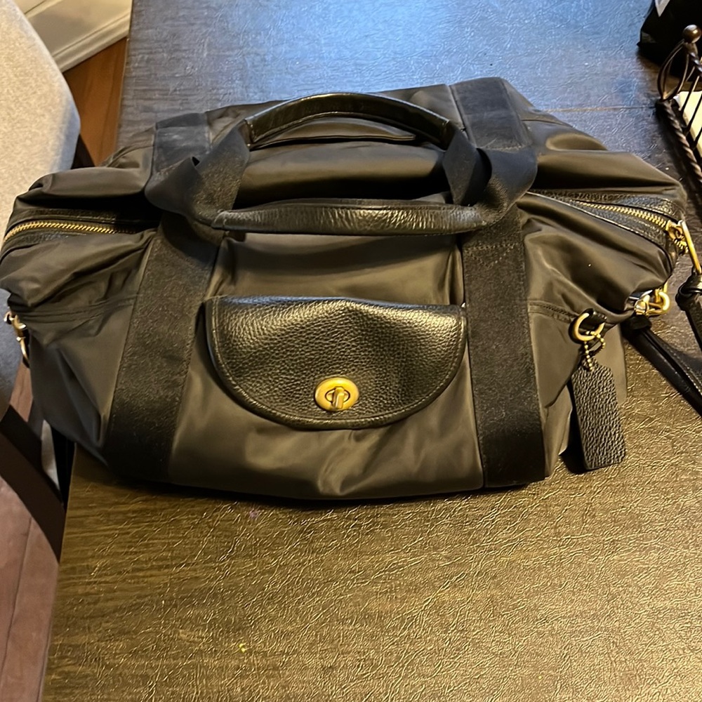 Coach nylon duffle bag! Like new! Only used once and comes with a makeup bag!!